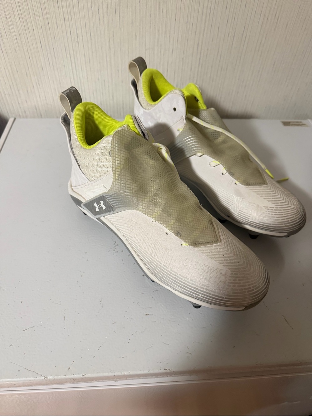 Under Armour White & Neon Yellow Athletic Cleats